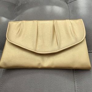 Gold metallic clutch